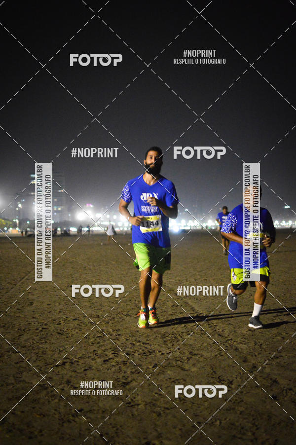 Buy your photos of the eventJovem Pan Night Run Santos on Fotop