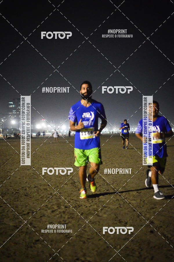 Buy your photos of the eventJovem Pan Night Run Santos on Fotop