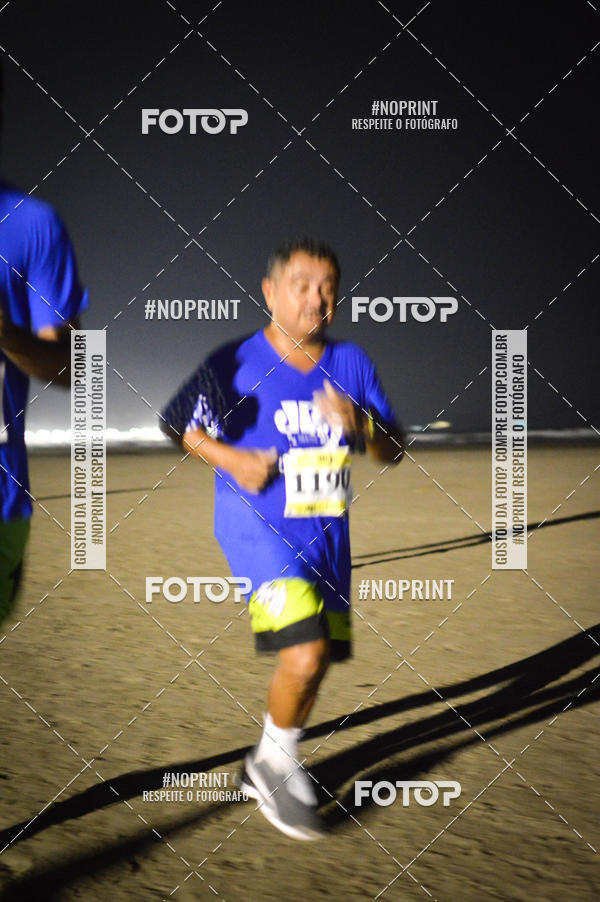 Buy your photos of the eventJovem Pan Night Run Santos on Fotop