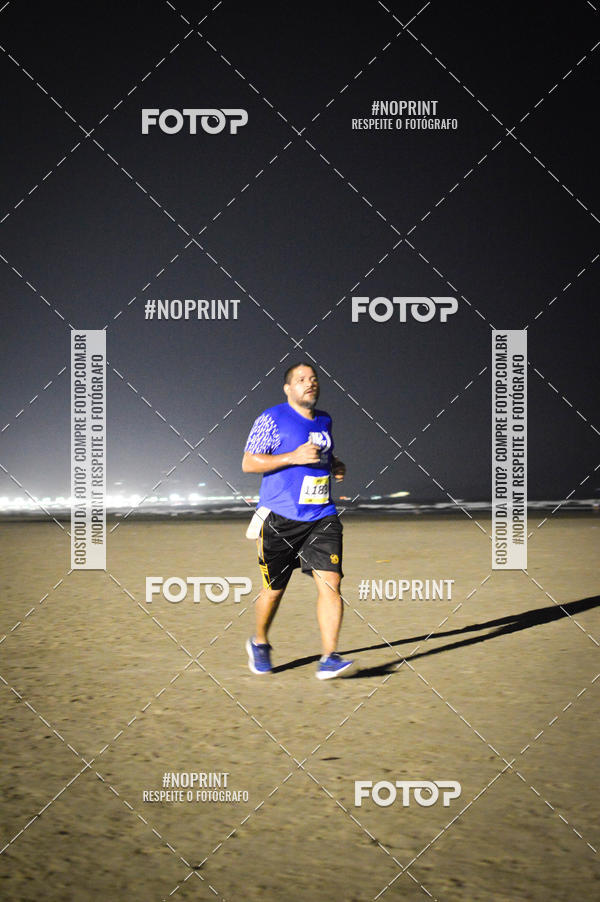 Buy your photos of the eventJovem Pan Night Run Santos on Fotop