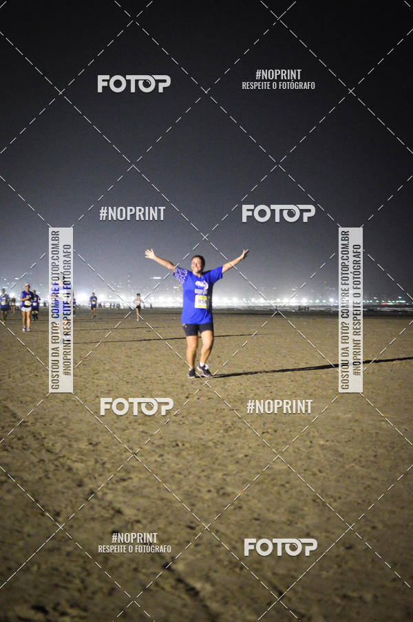 Buy your photos of the eventJovem Pan Night Run Santos on Fotop