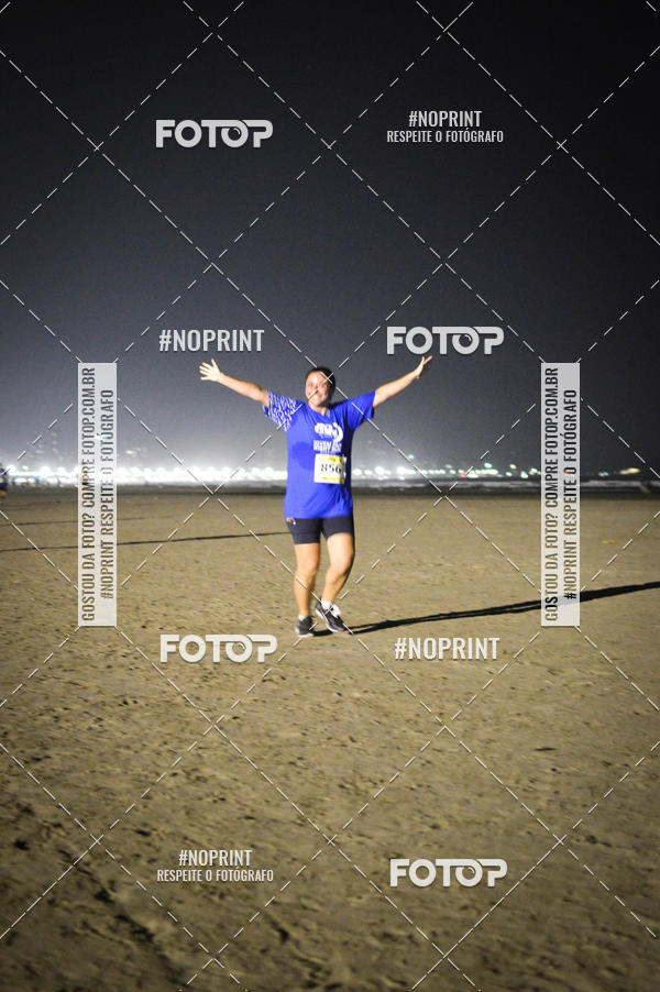 Buy your photos of the eventJovem Pan Night Run Santos on Fotop