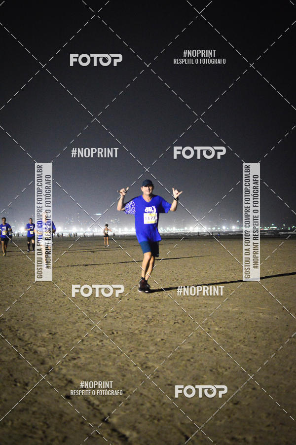 Buy your photos of the eventJovem Pan Night Run Santos on Fotop