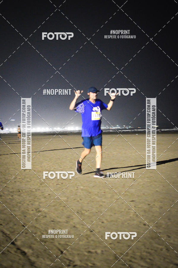 Buy your photos of the eventJovem Pan Night Run Santos on Fotop