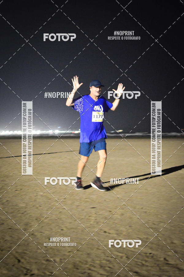 Buy your photos of the eventJovem Pan Night Run Santos on Fotop