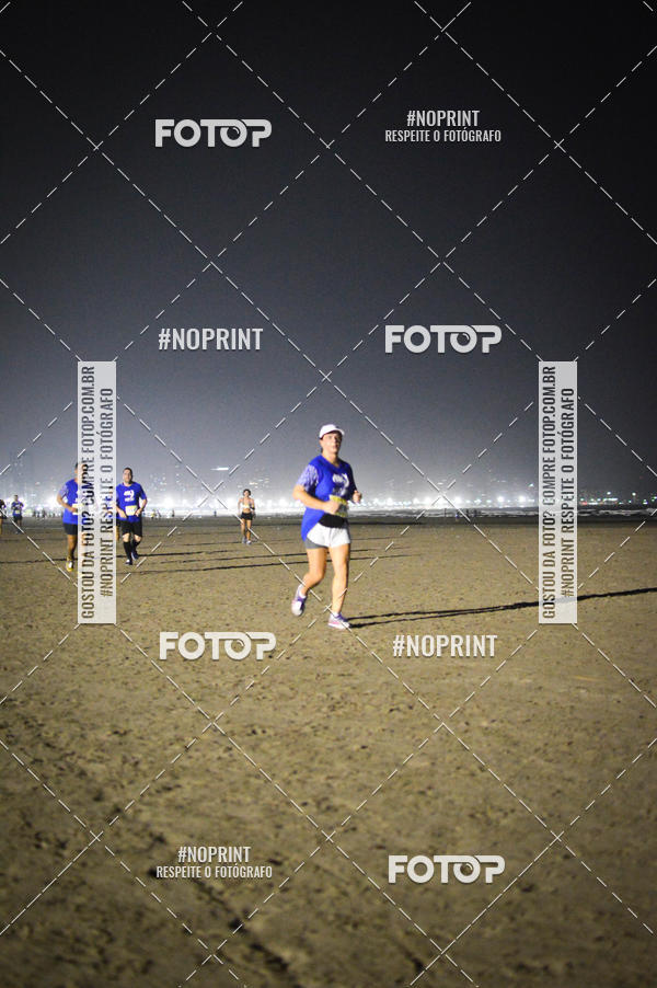 Buy your photos of the eventJovem Pan Night Run Santos on Fotop