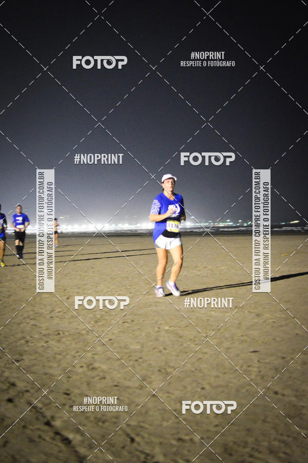 Buy your photos of the eventJovem Pan Night Run Santos on Fotop