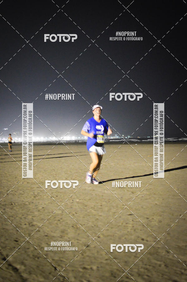 Buy your photos of the eventJovem Pan Night Run Santos on Fotop