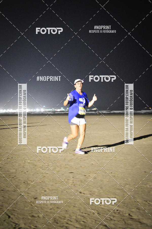 Buy your photos of the eventJovem Pan Night Run Santos on Fotop