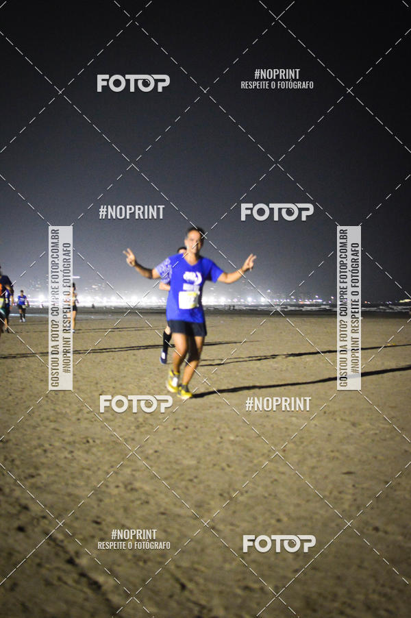Buy your photos of the eventJovem Pan Night Run Santos on Fotop