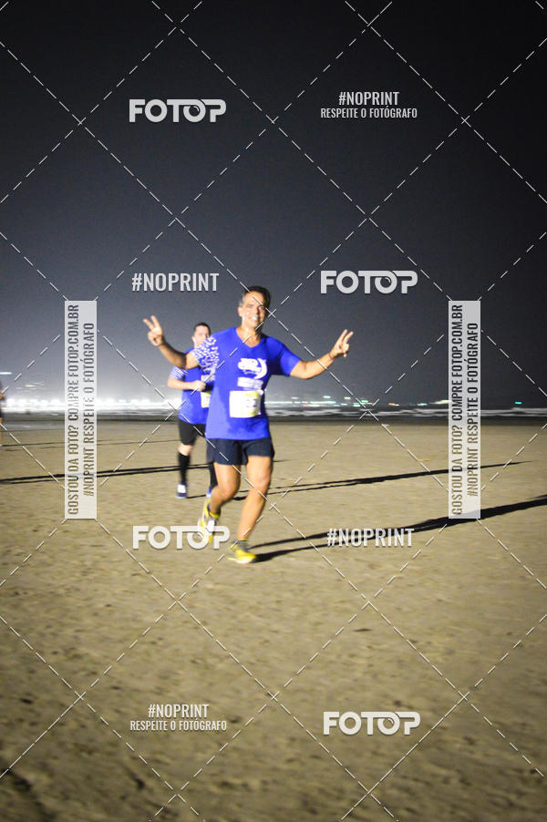 Buy your photos of the eventJovem Pan Night Run Santos on Fotop