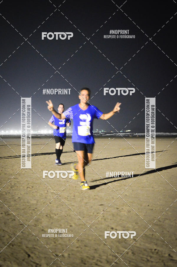 Buy your photos of the eventJovem Pan Night Run Santos on Fotop