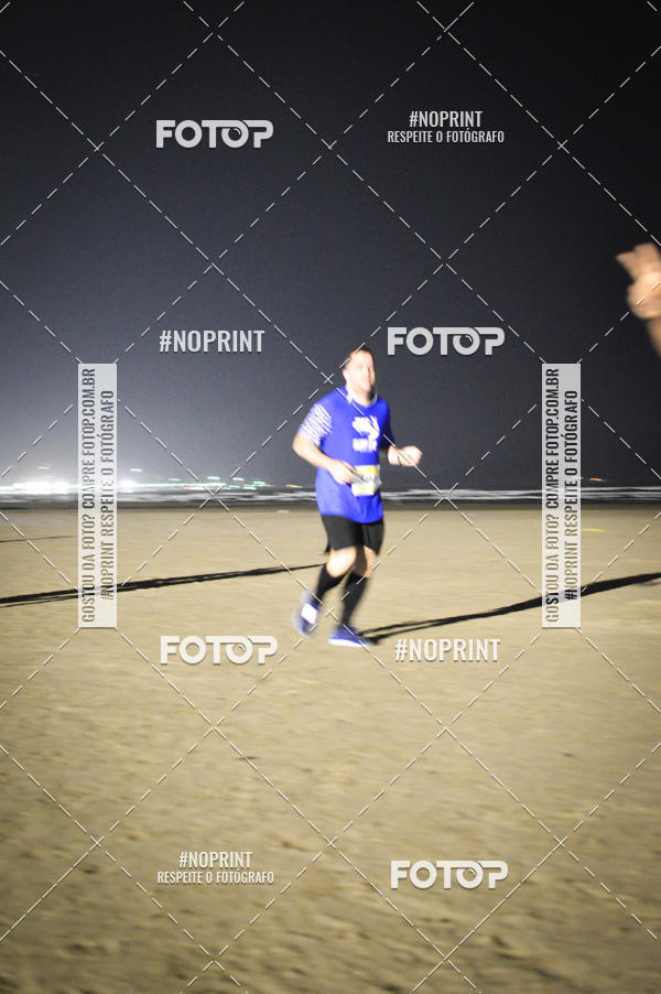 Buy your photos of the eventJovem Pan Night Run Santos on Fotop