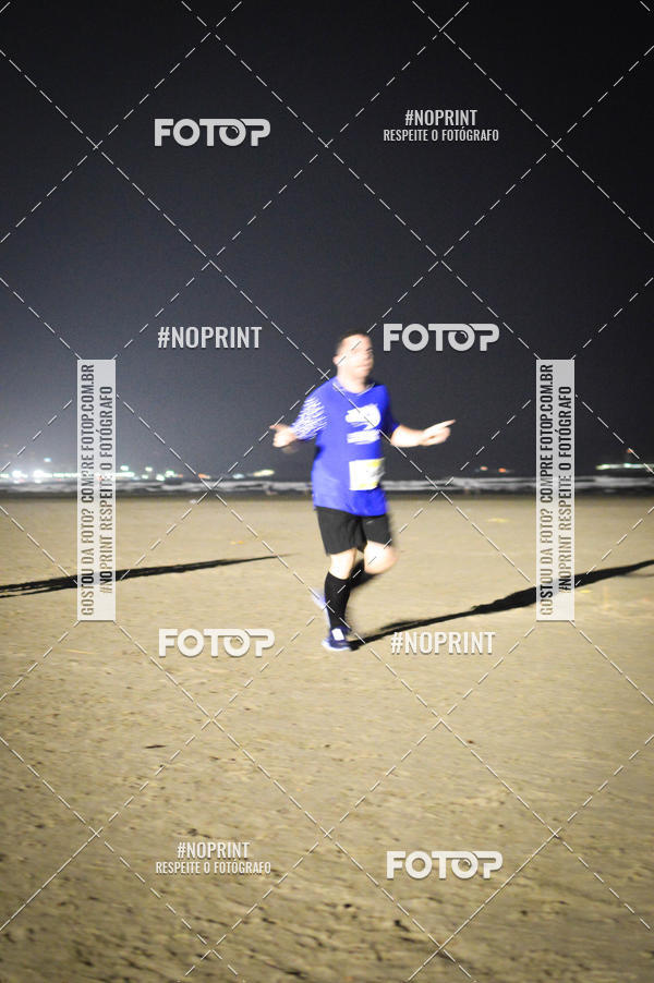 Buy your photos of the eventJovem Pan Night Run Santos on Fotop