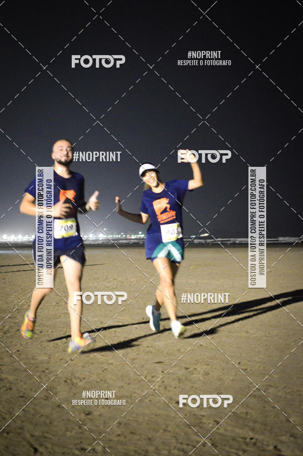 Buy your photos of the eventJovem Pan Night Run Santos on Fotop