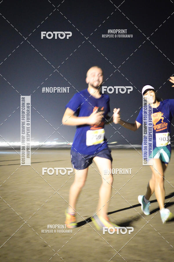 Buy your photos of the eventJovem Pan Night Run Santos on Fotop