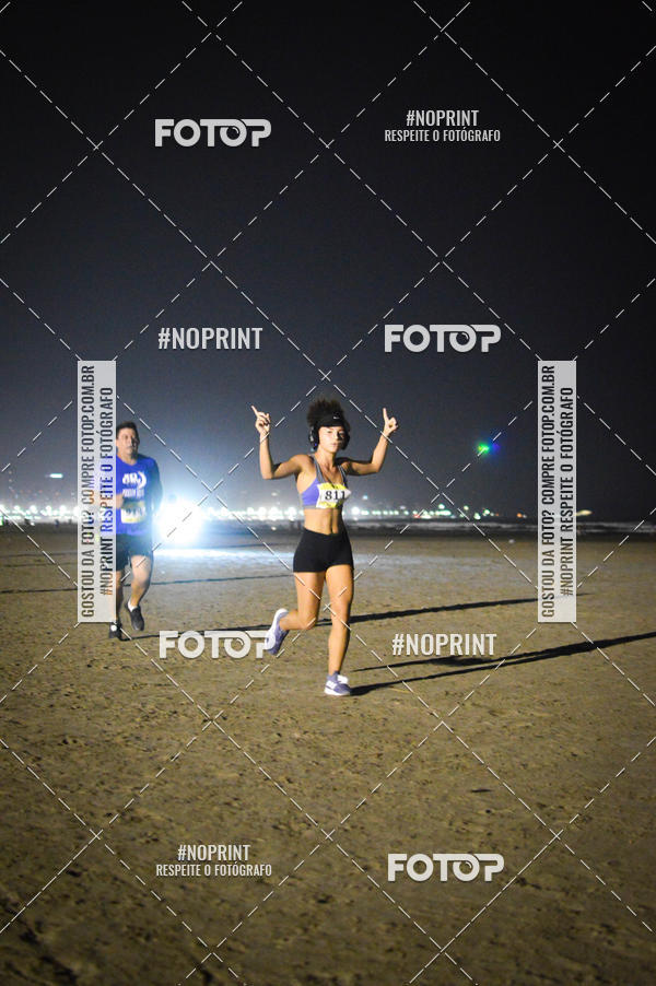 Buy your photos of the eventJovem Pan Night Run Santos on Fotop