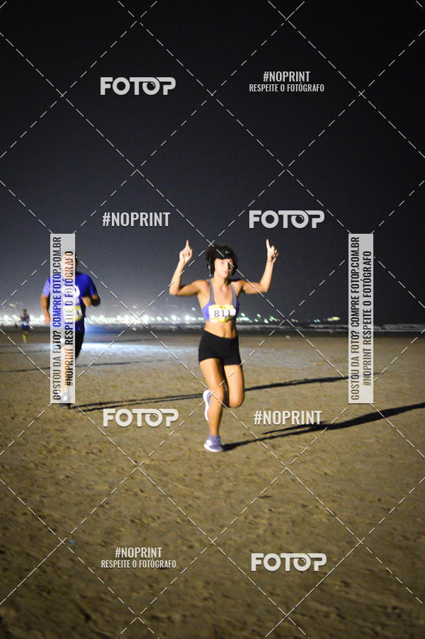 Buy your photos of the eventJovem Pan Night Run Santos on Fotop