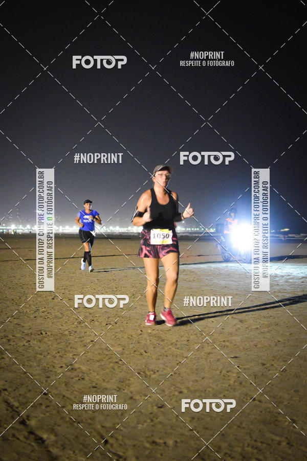 Buy your photos of the eventJovem Pan Night Run Santos on Fotop
