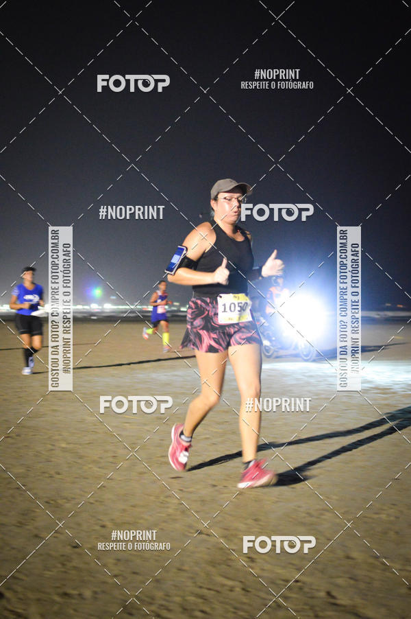Buy your photos of the eventJovem Pan Night Run Santos on Fotop
