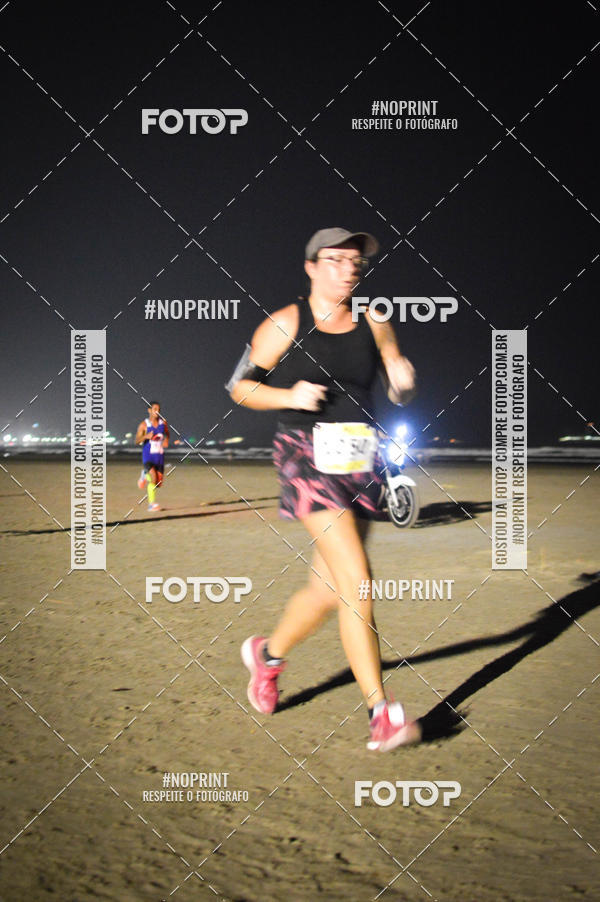 Buy your photos of the eventJovem Pan Night Run Santos on Fotop