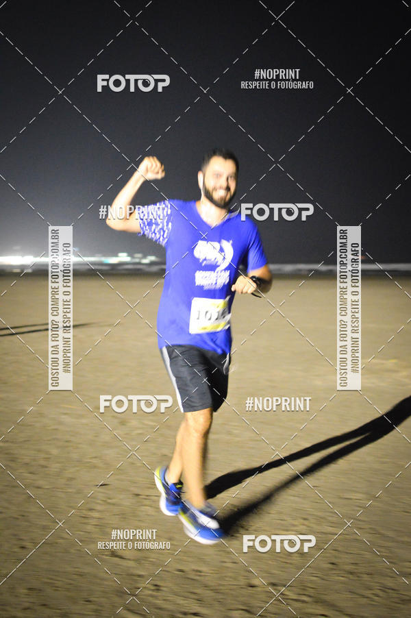Buy your photos of the eventJovem Pan Night Run Santos on Fotop
