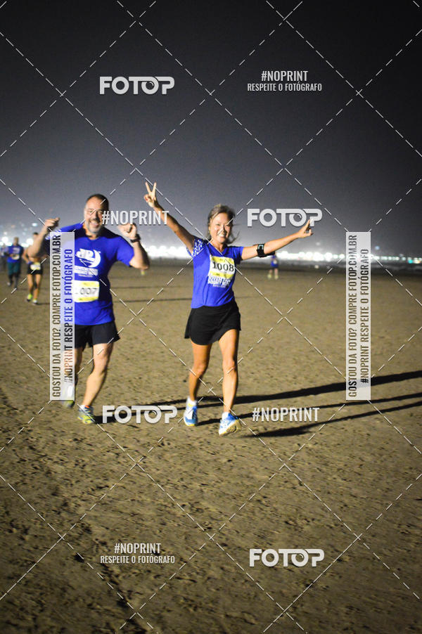 Buy your photos of the eventJovem Pan Night Run Santos on Fotop