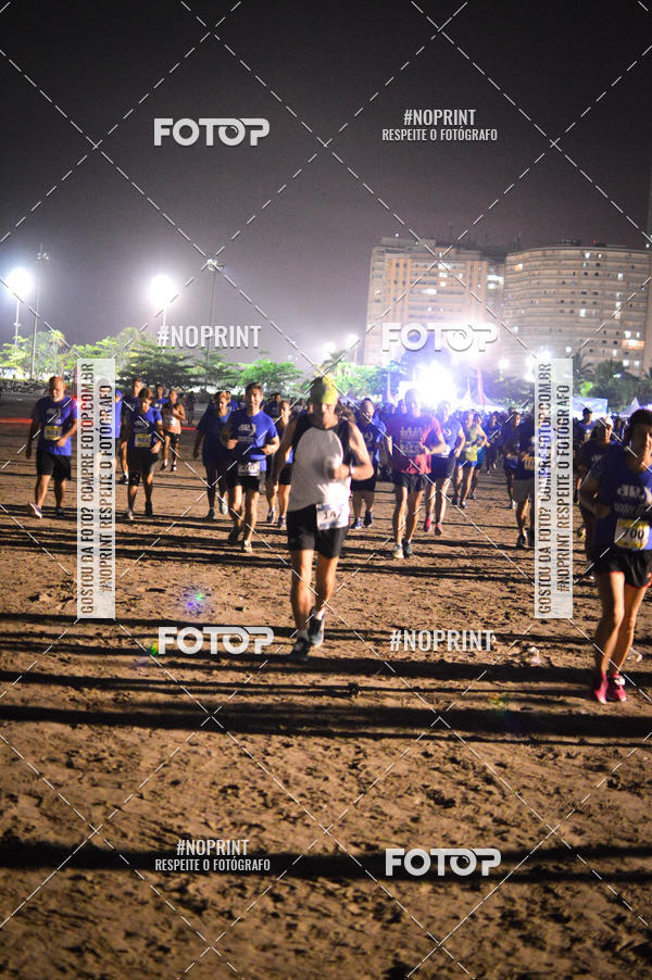 Buy your photos of the eventJovem Pan Night Run Santos on Fotop
