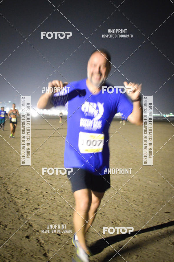 Buy your photos of the eventJovem Pan Night Run Santos on Fotop