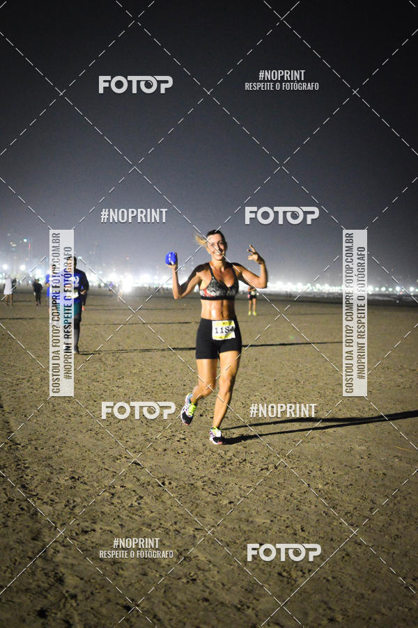 Buy your photos of the eventJovem Pan Night Run Santos on Fotop