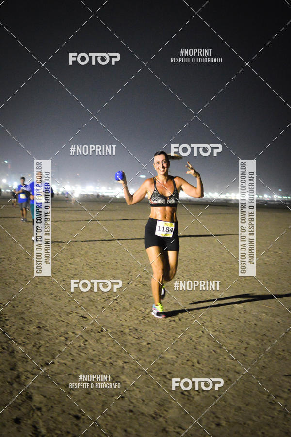Buy your photos of the eventJovem Pan Night Run Santos on Fotop