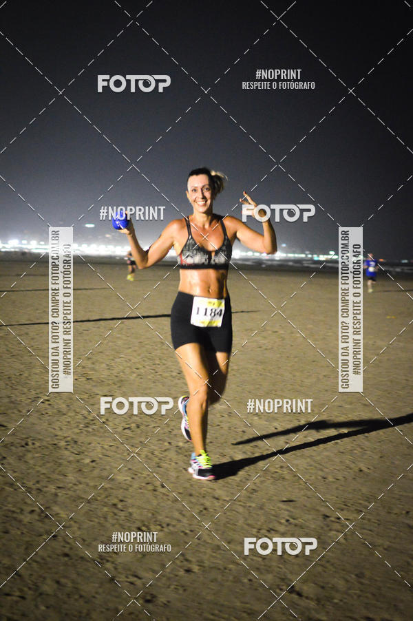 Buy your photos of the eventJovem Pan Night Run Santos on Fotop