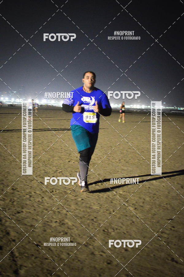 Buy your photos of the eventJovem Pan Night Run Santos on Fotop