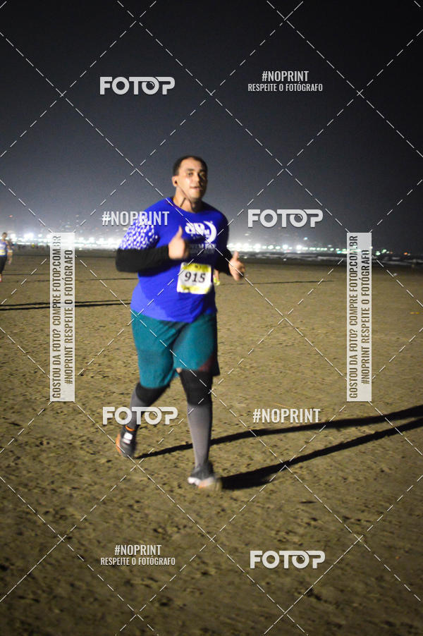 Buy your photos of the eventJovem Pan Night Run Santos on Fotop
