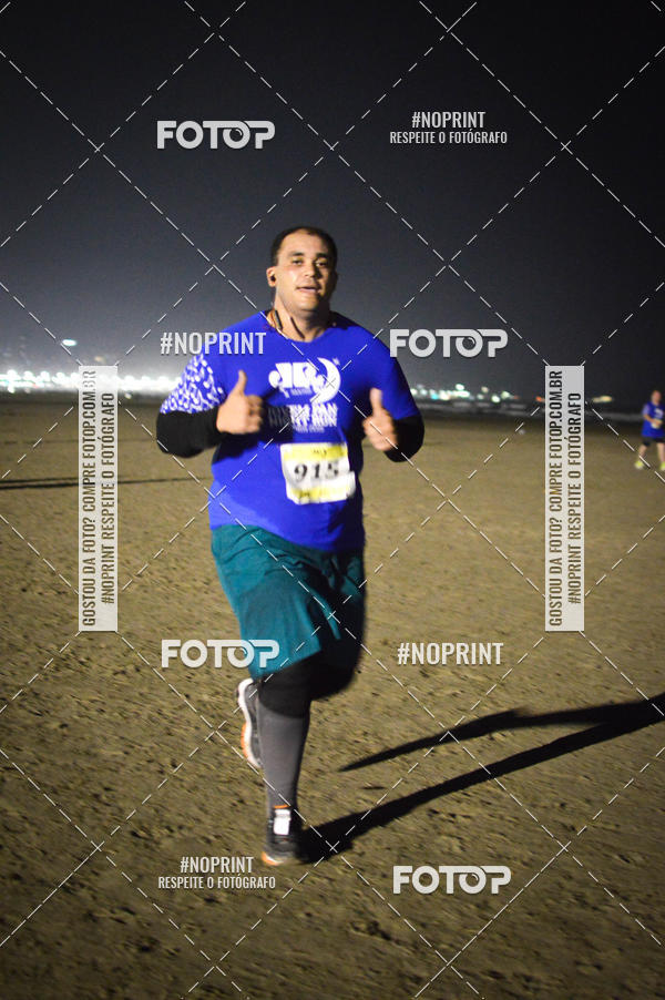 Buy your photos of the eventJovem Pan Night Run Santos on Fotop