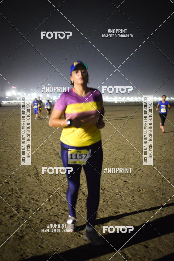 Buy your photos of the eventJovem Pan Night Run Santos on Fotop
