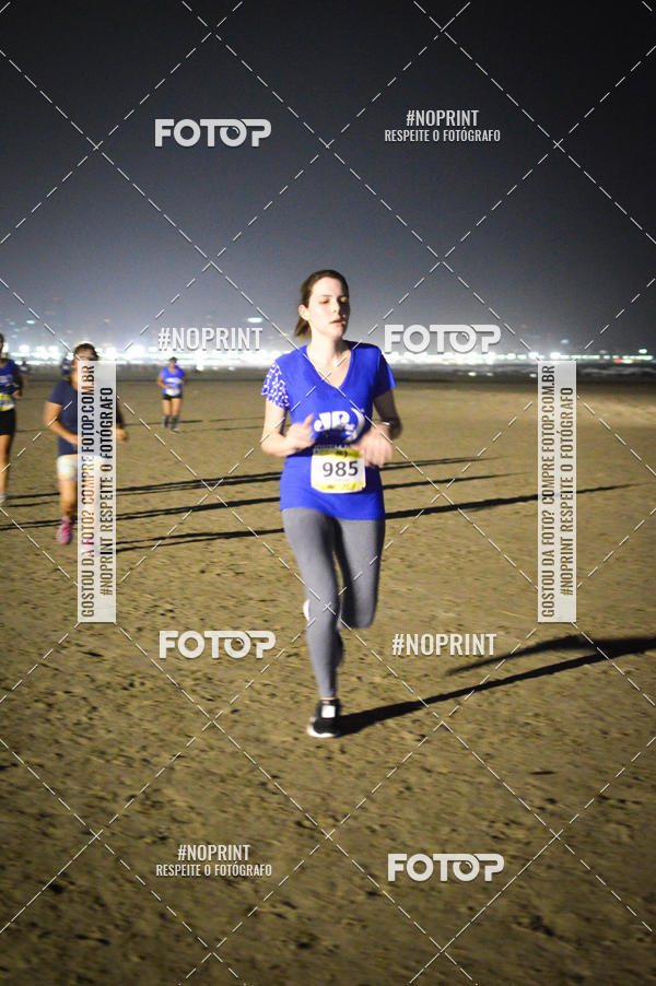 Buy your photos of the eventJovem Pan Night Run Santos on Fotop