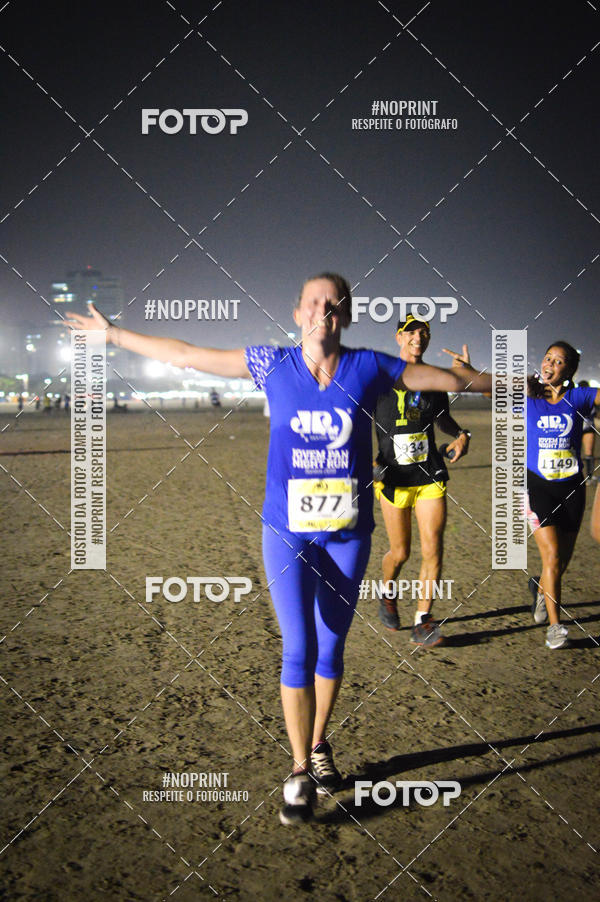 Buy your photos of the eventJovem Pan Night Run Santos on Fotop