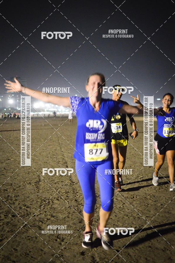 Buy your photos of the eventJovem Pan Night Run Santos on Fotop