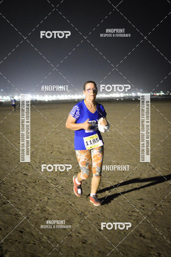 Buy your photos of the eventJovem Pan Night Run Santos on Fotop