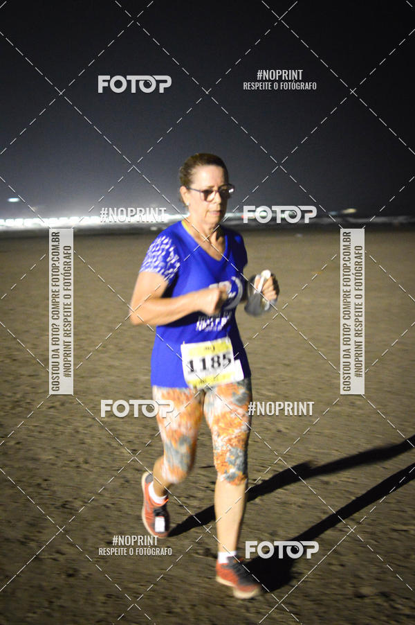 Buy your photos of the eventJovem Pan Night Run Santos on Fotop