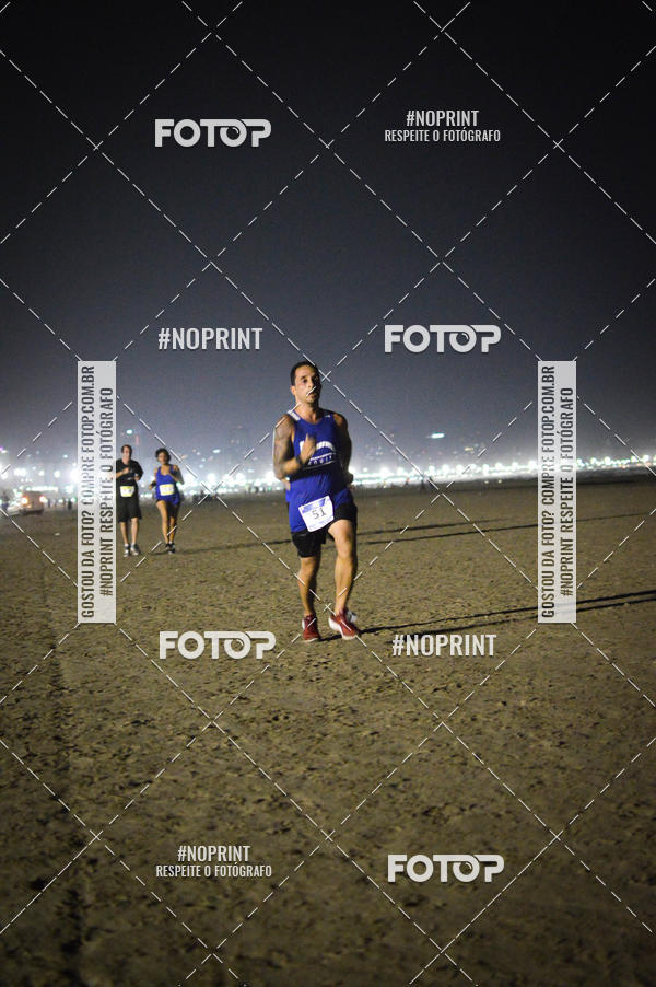 Buy your photos of the eventJovem Pan Night Run Santos on Fotop