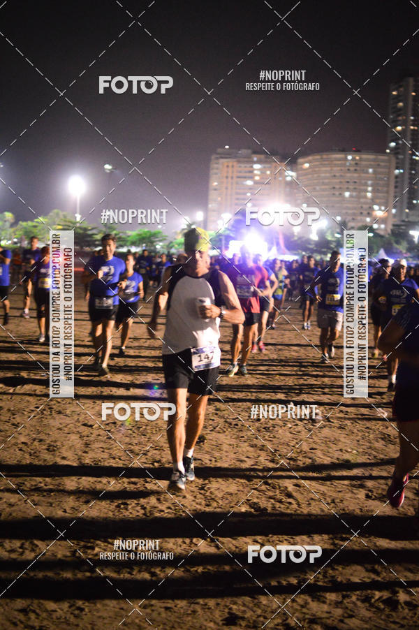 Buy your photos of the eventJovem Pan Night Run Santos on Fotop