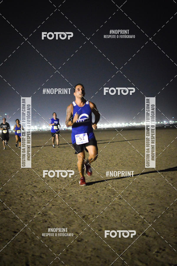 Buy your photos of the eventJovem Pan Night Run Santos on Fotop