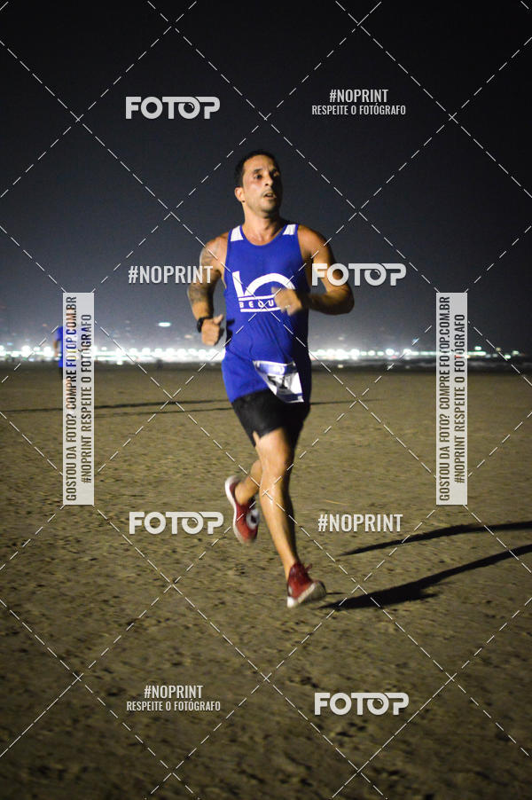 Buy your photos of the eventJovem Pan Night Run Santos on Fotop