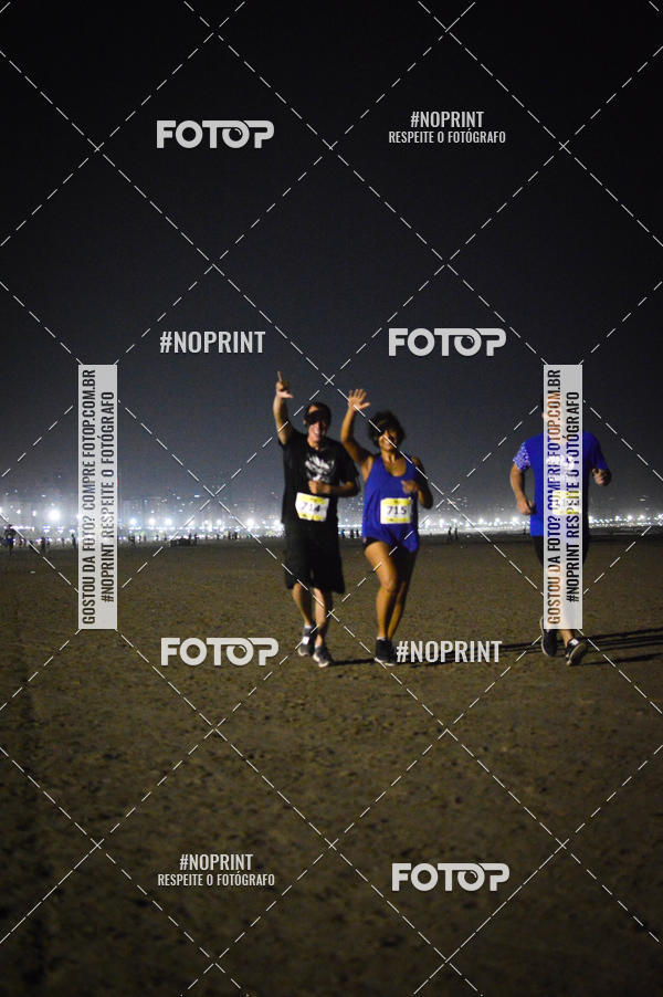 Buy your photos of the eventJovem Pan Night Run Santos on Fotop