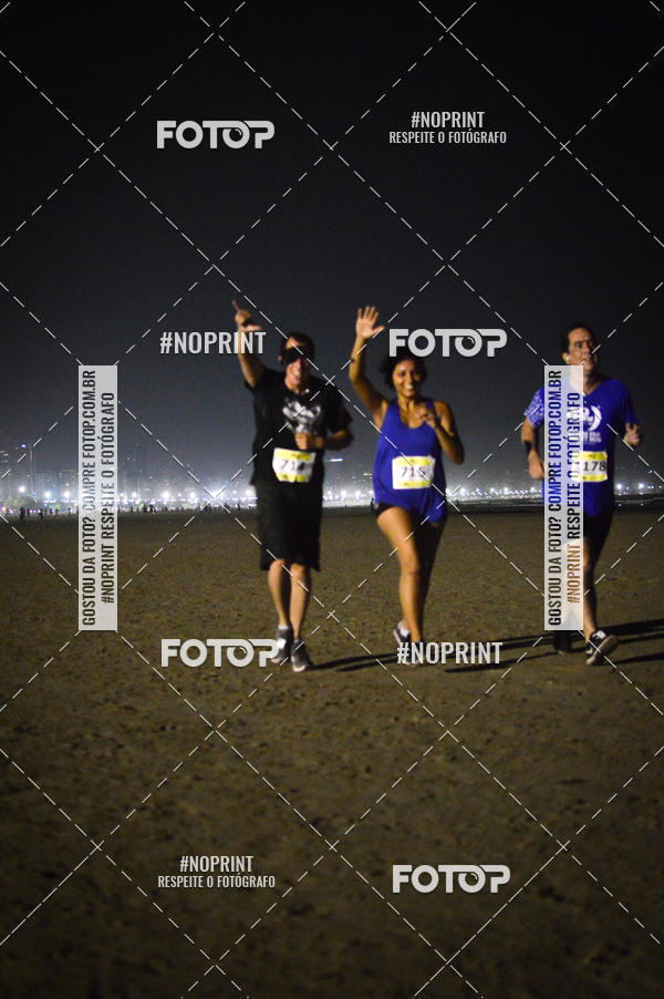 Buy your photos of the eventJovem Pan Night Run Santos on Fotop