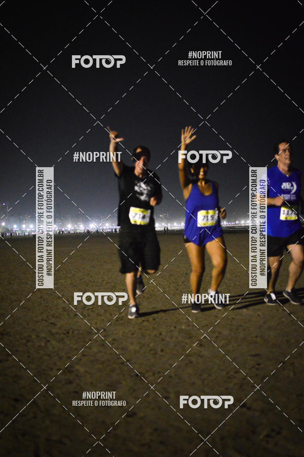 Buy your photos of the eventJovem Pan Night Run Santos on Fotop
