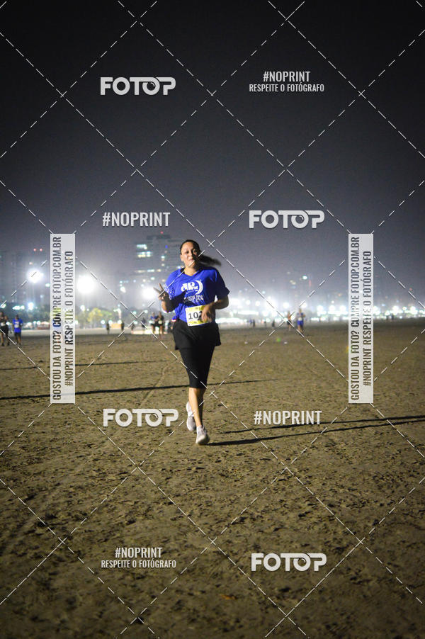 Buy your photos of the eventJovem Pan Night Run Santos on Fotop