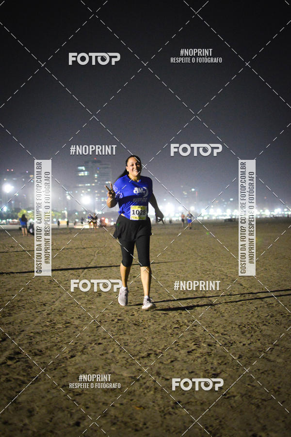 Buy your photos of the eventJovem Pan Night Run Santos on Fotop
